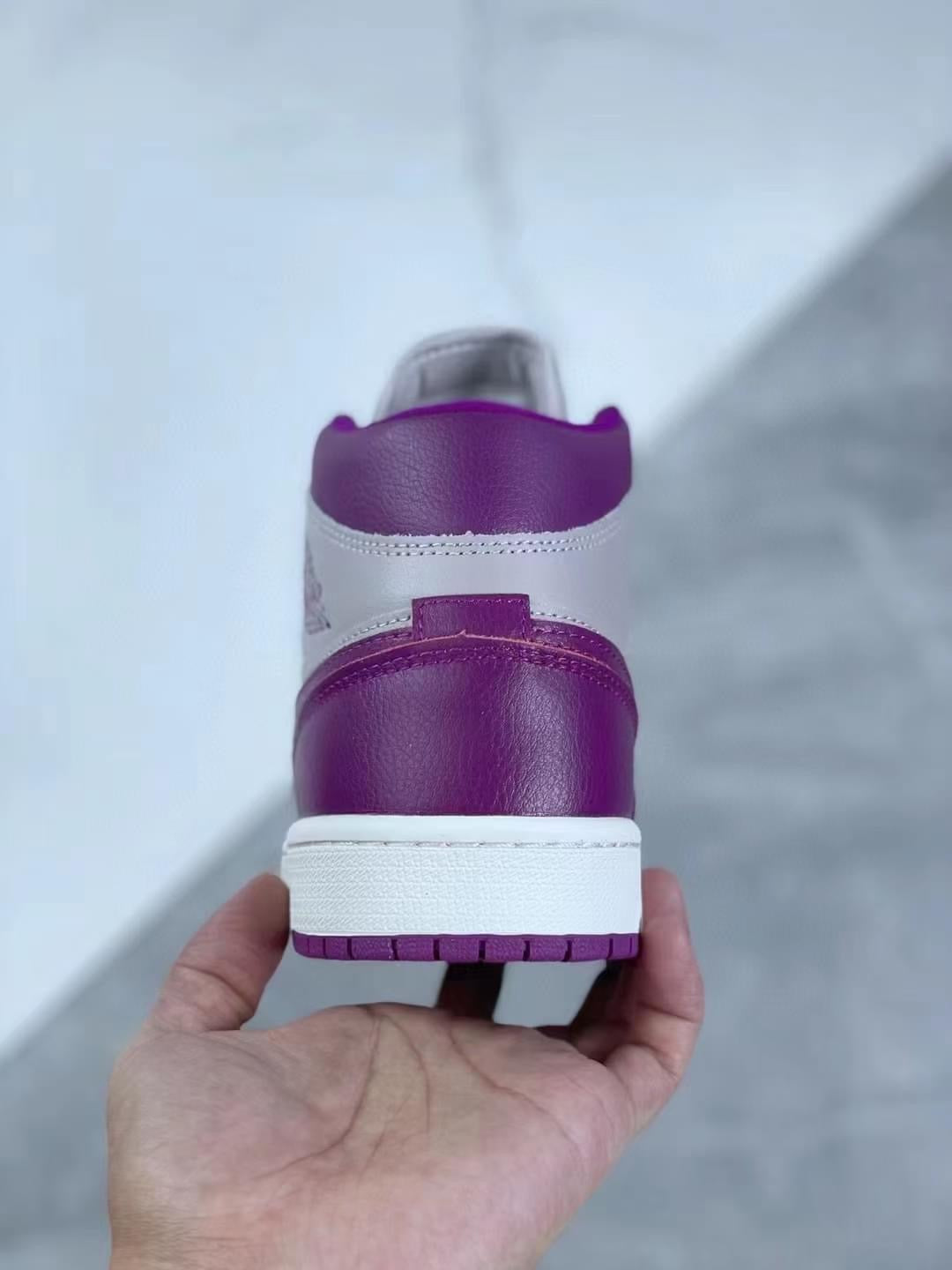 Jordan 1 Mid Magenta